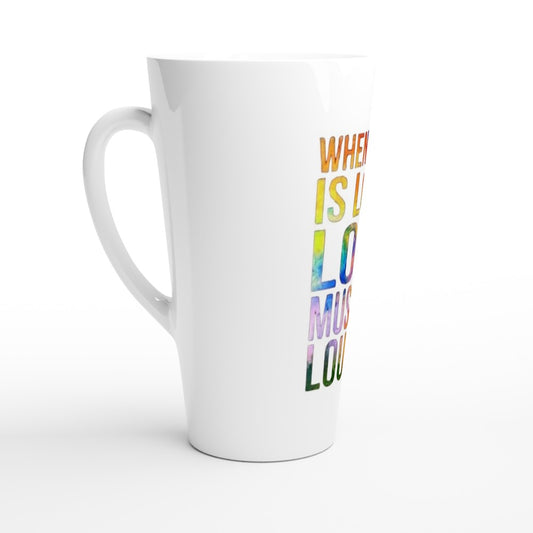 A stylish 17oz white ceramic latte mug featuring the inspiring words ‘Love must be louder’ in rainbow colours.