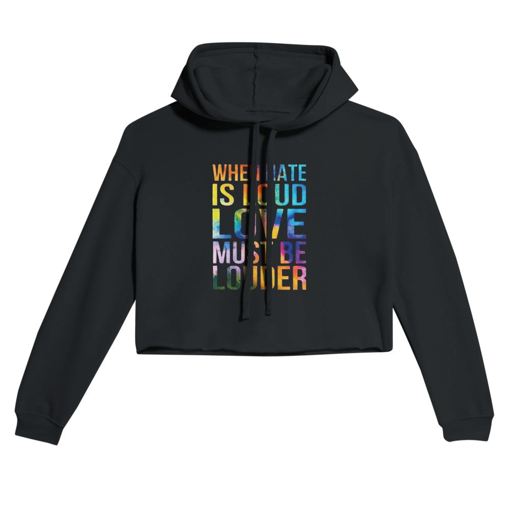 A vibrant women’s cropped hoodie featuring the phrase ‘When hate is loud, love must be louder’ in bold rainbow coloured lettering. Available in a range of colours.