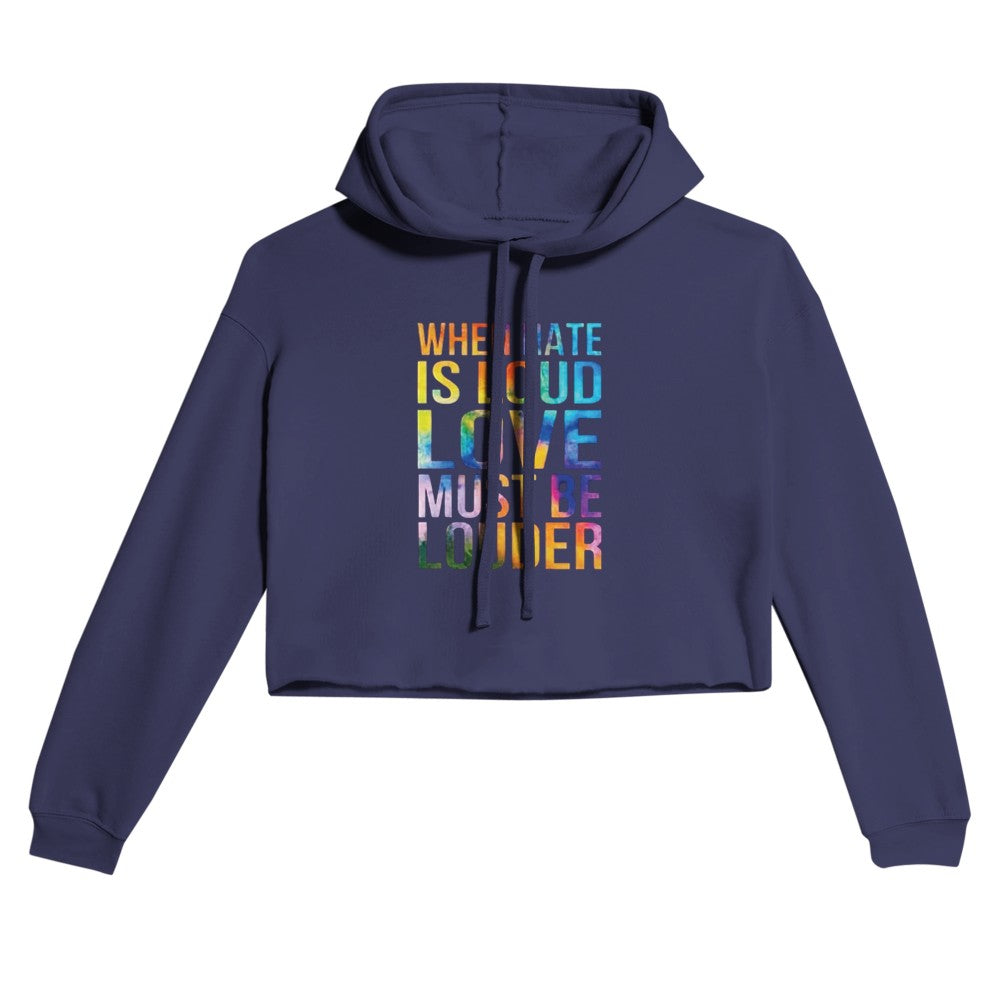 A vibrant women’s cropped hoodie featuring the phrase ‘When hate is loud, love must be louder’ in bold rainbow coloured lettering. Available in a range of colours.