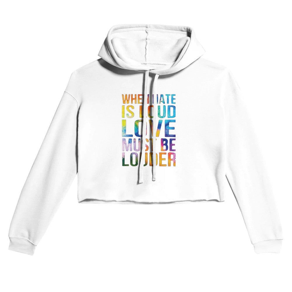 A vibrant women’s cropped hoodie featuring the phrase ‘When hate is loud, love must be louder’ in bold rainbow coloured lettering. Available in a range of colours.